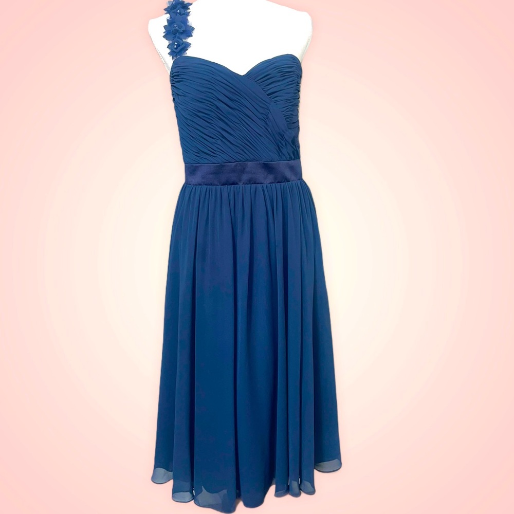 Ruched, gathered and gorgeous navy blue gown